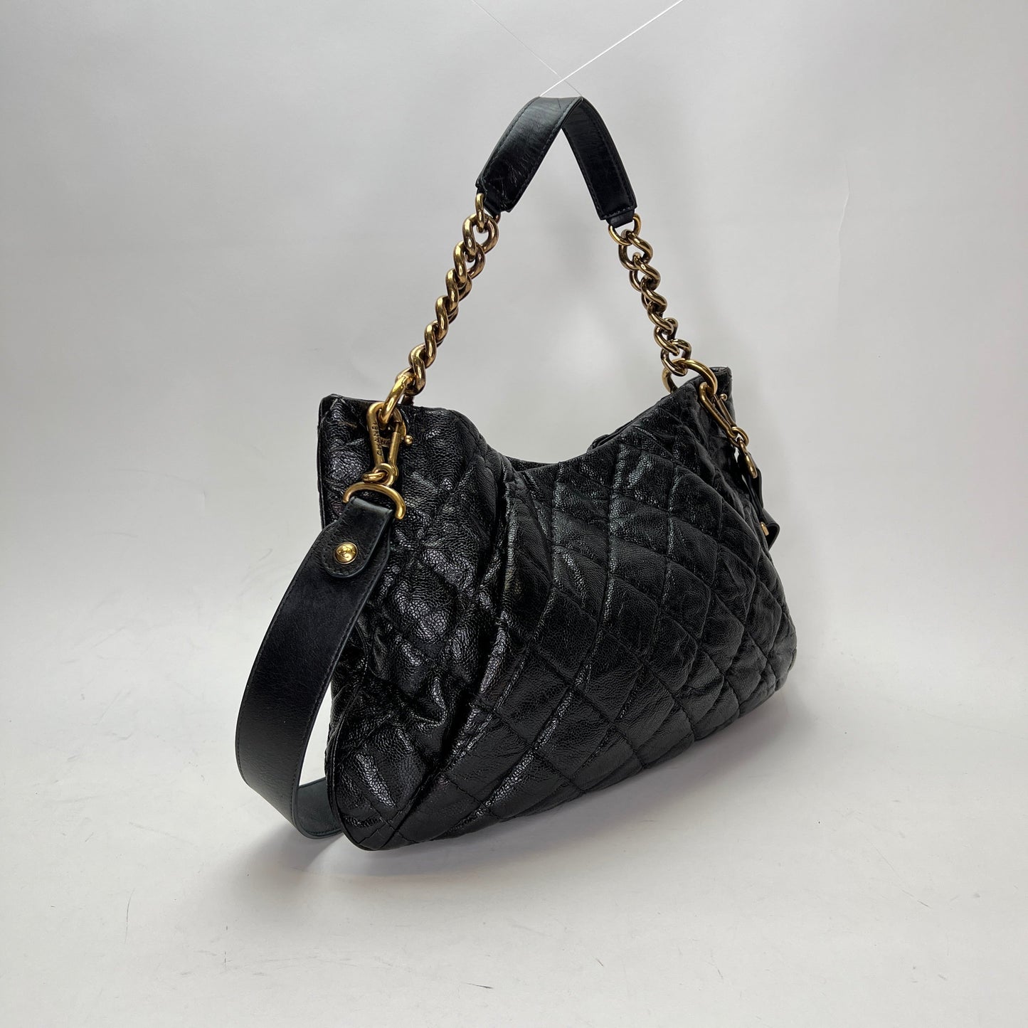 Coco pleats Black Shoulder Bag in Caviar Leather, Gold hardware
