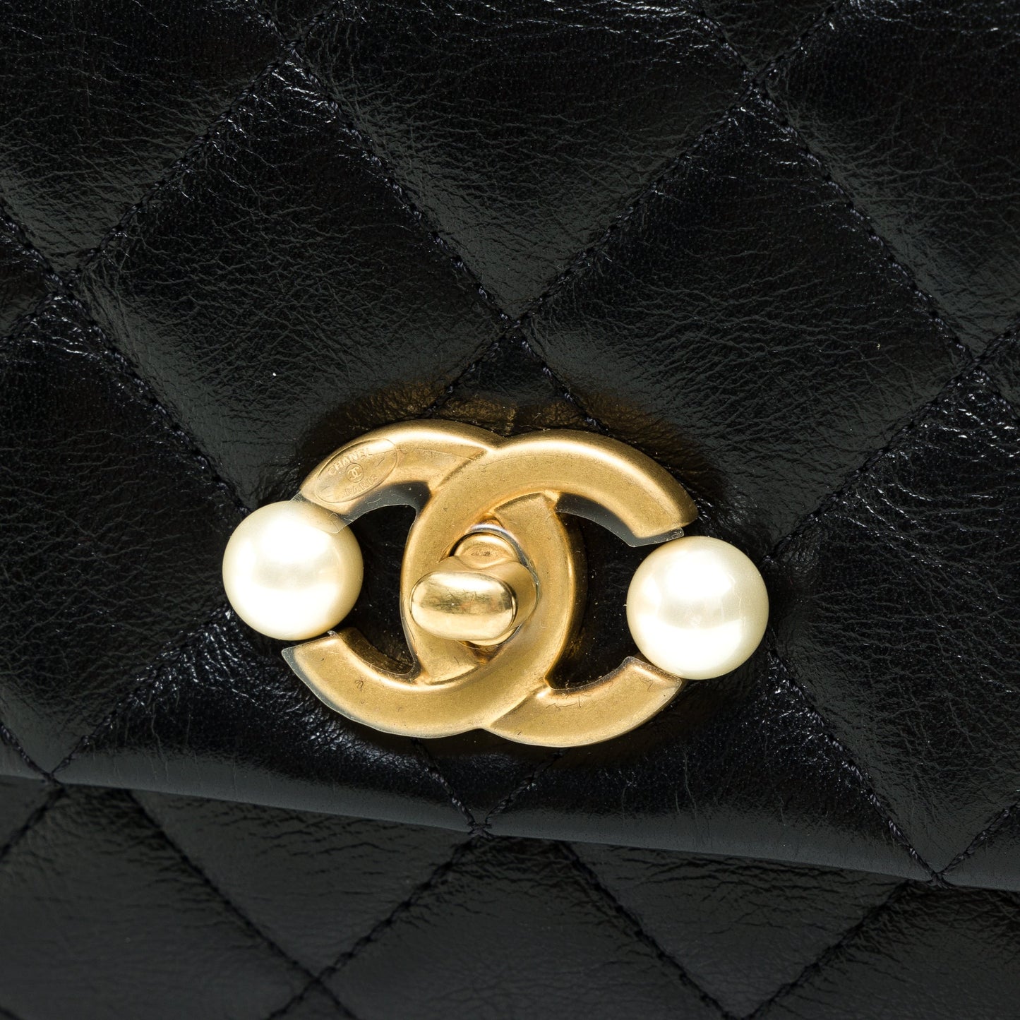 Single Flap Pearl Mini Black Crossbody Bag in Calfskin, Gold hardware