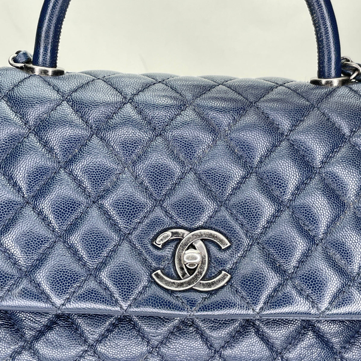 Coco Navy Top Handle Bag in Caviar Leather, Ruthenium hardware