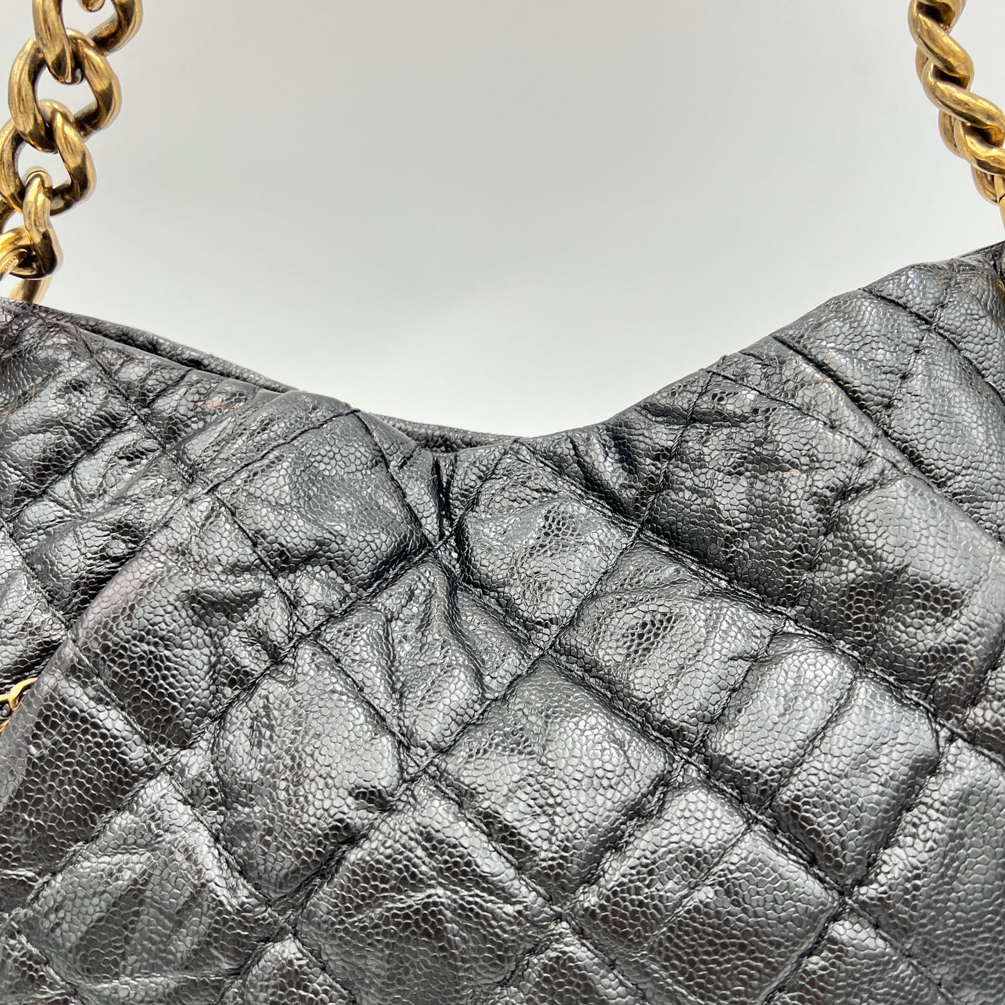 Coco pleats Black Shoulder Bag in Caviar Leather, Gold hardware