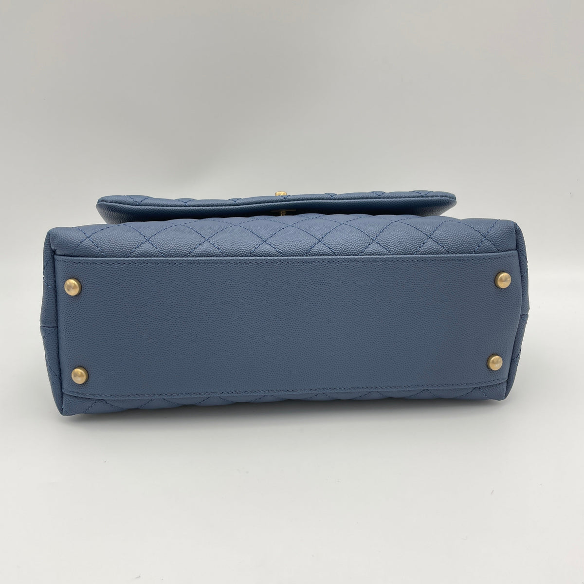 Coco Flap Blue Top Handle Bag in Caviar Leather, Gold hardware