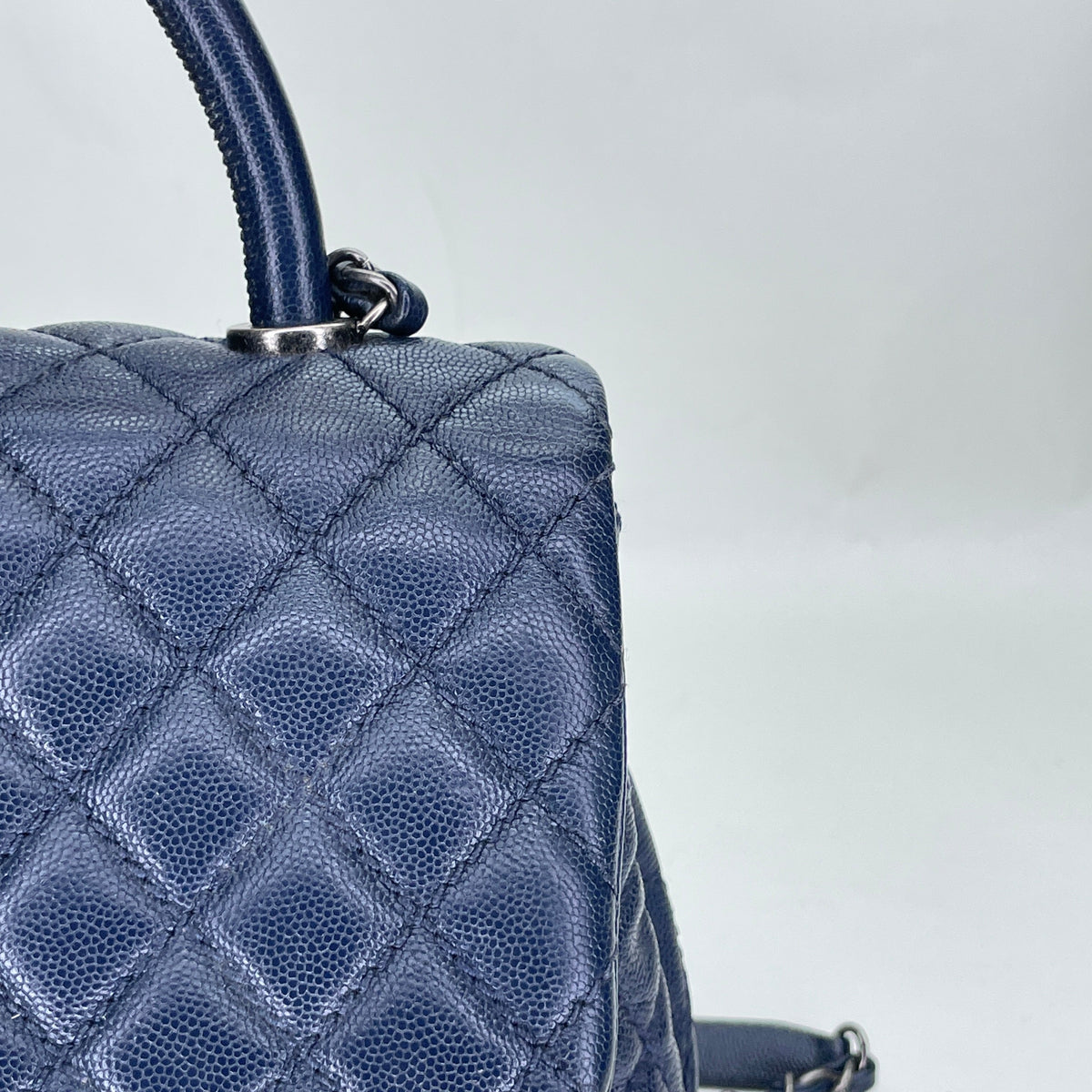 Coco Navy Top Handle Bag in Caviar Leather, Ruthenium hardware