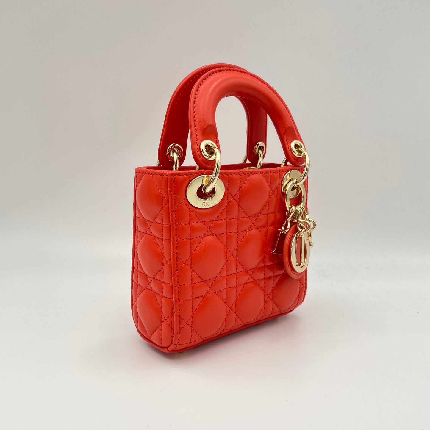Lady Dior Micro Orange Top Handle Bag in Lambskin, Gold hardware