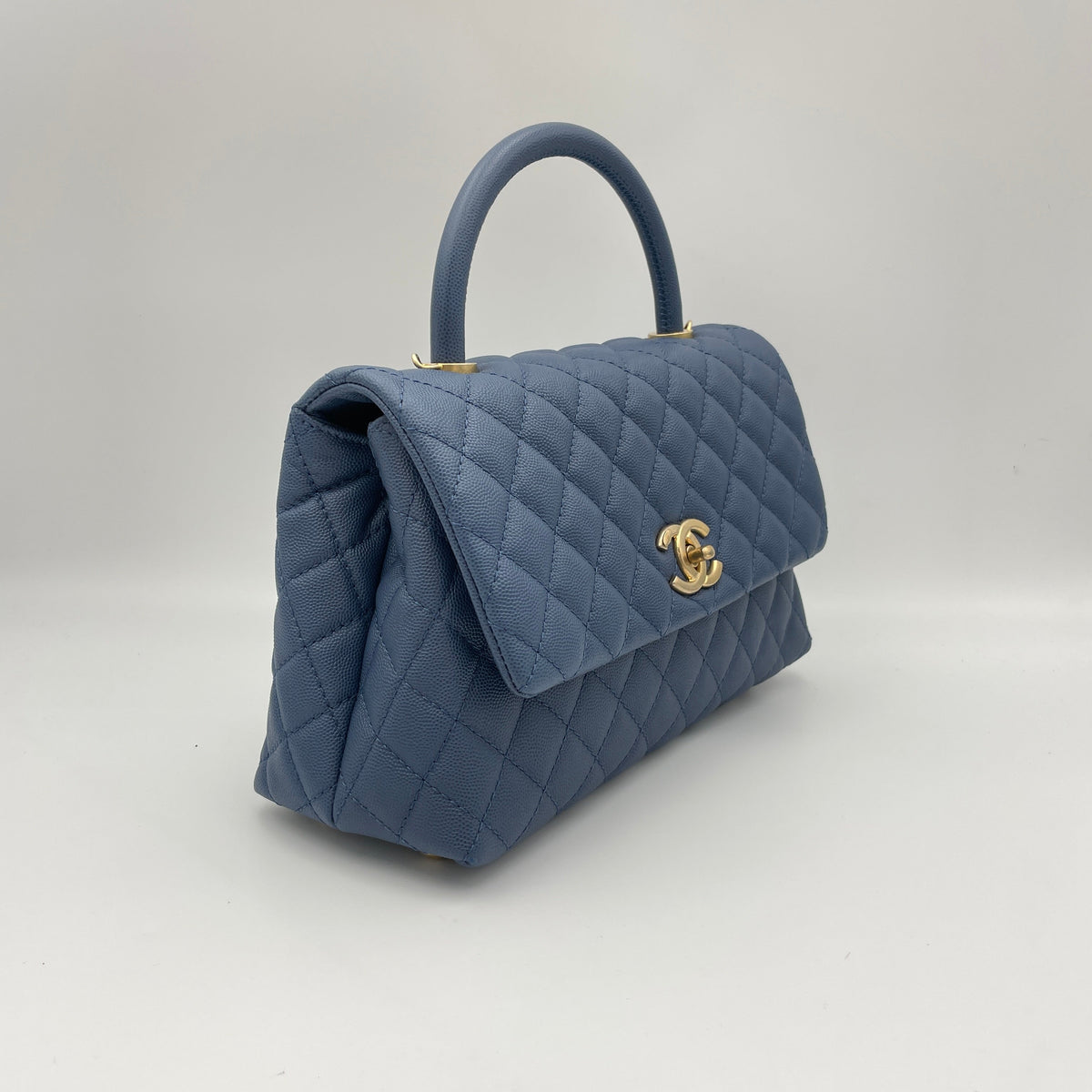 Coco Flap Blue Top Handle Bag in Caviar Leather, Gold hardware