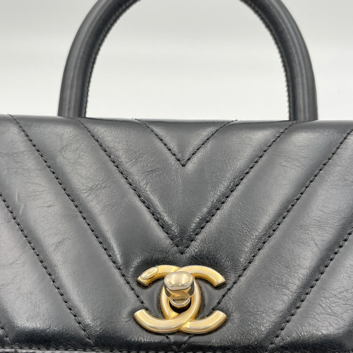 Coco Flap Black Top Handle Bag in Calfskin, Gold hardware