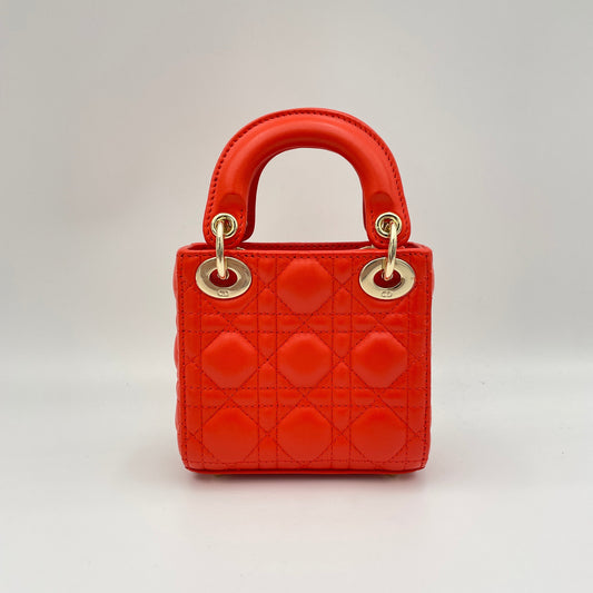 Lady Dior Micro Orange Top Handle Bag in Lambskin, Gold hardware
