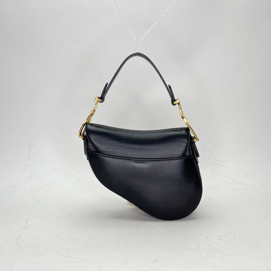Saddle Mini Black Shoulder Bag in Calfskin, Gold hardware