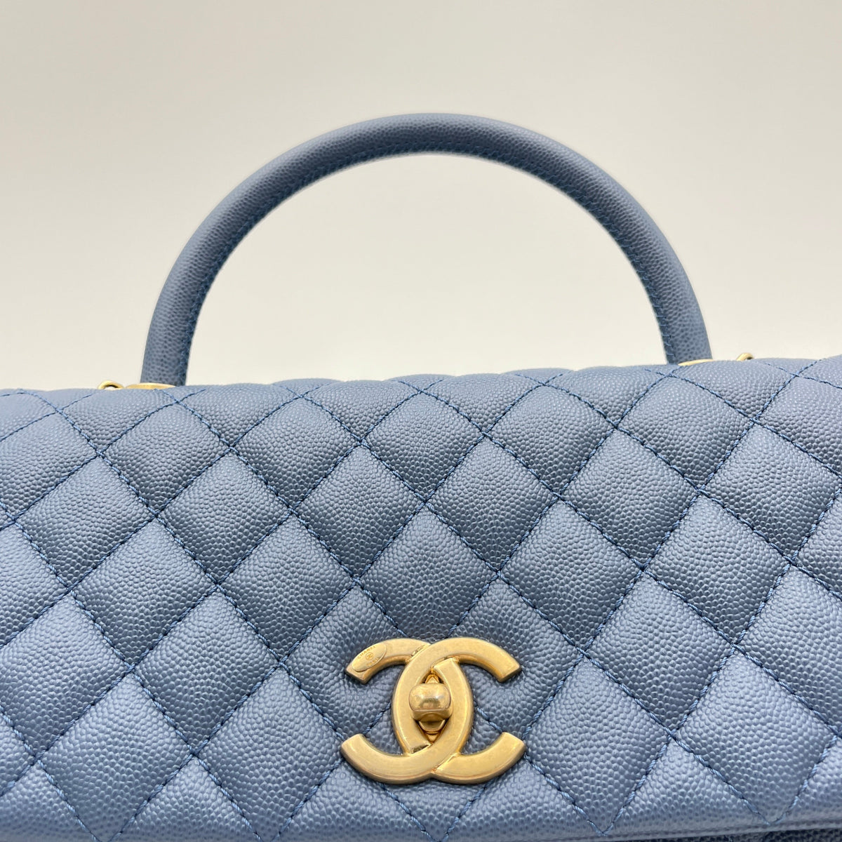 Coco Flap Blue Top Handle Bag in Caviar Leather, Gold hardware