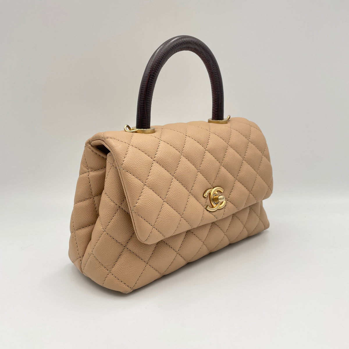Coco Small Beige Top Handle Bag in Caviar Leather, Gold hardware