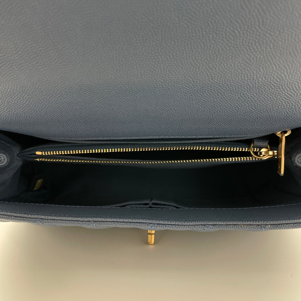 Coco Flap Blue Top Handle Bag in Caviar Leather, Gold hardware