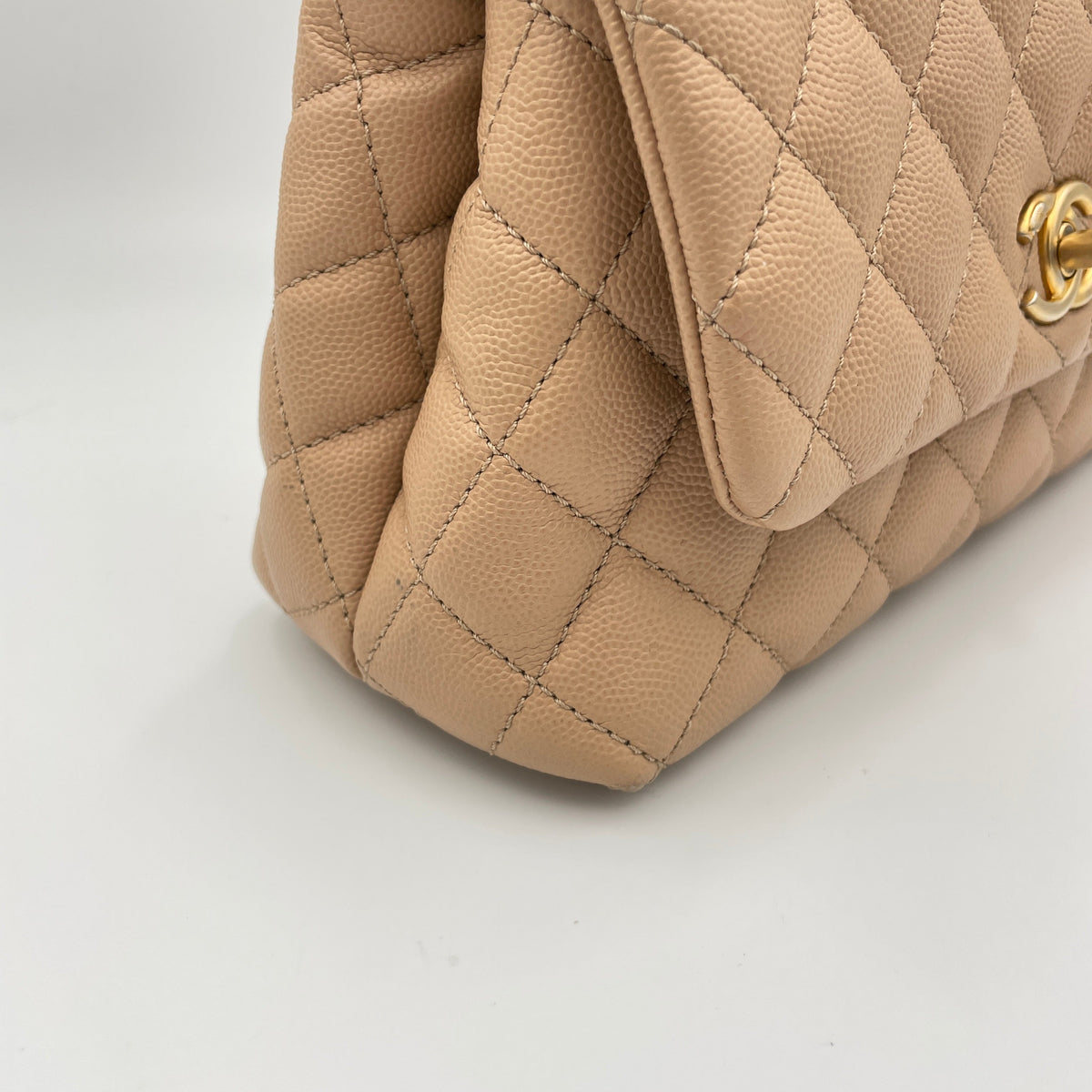 Coco Small Beige Top Handle Bag in Caviar Leather, Gold hardware