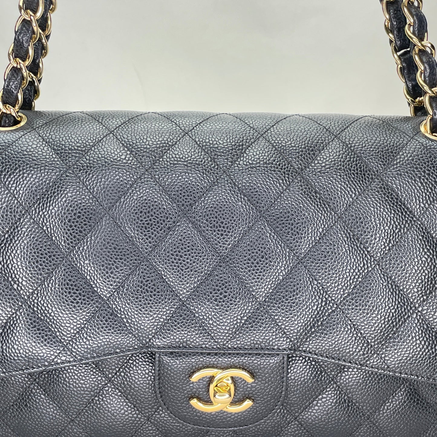 Classic Double Flap Jumbo Black Shoulder Bag in Caviar Leather, Gold hardware