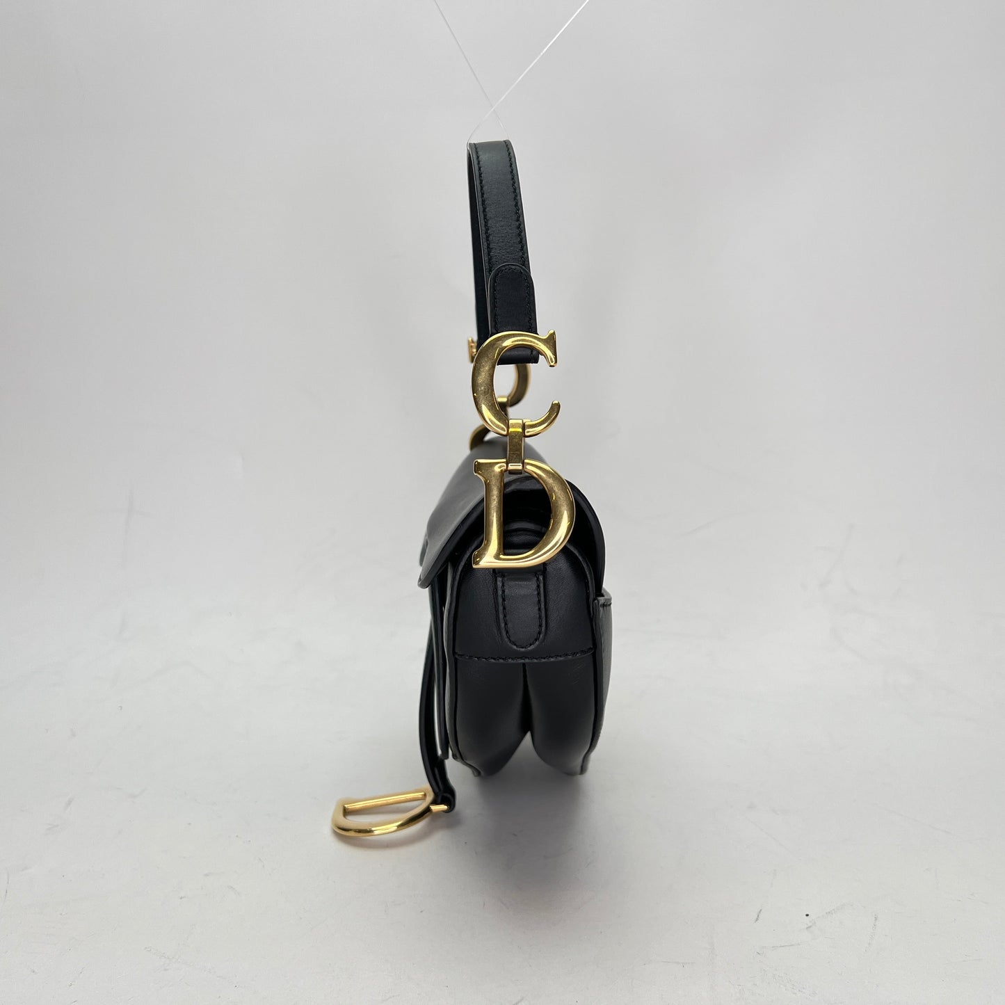 Saddle Mini Black Shoulder Bag in Calfskin, Gold hardware