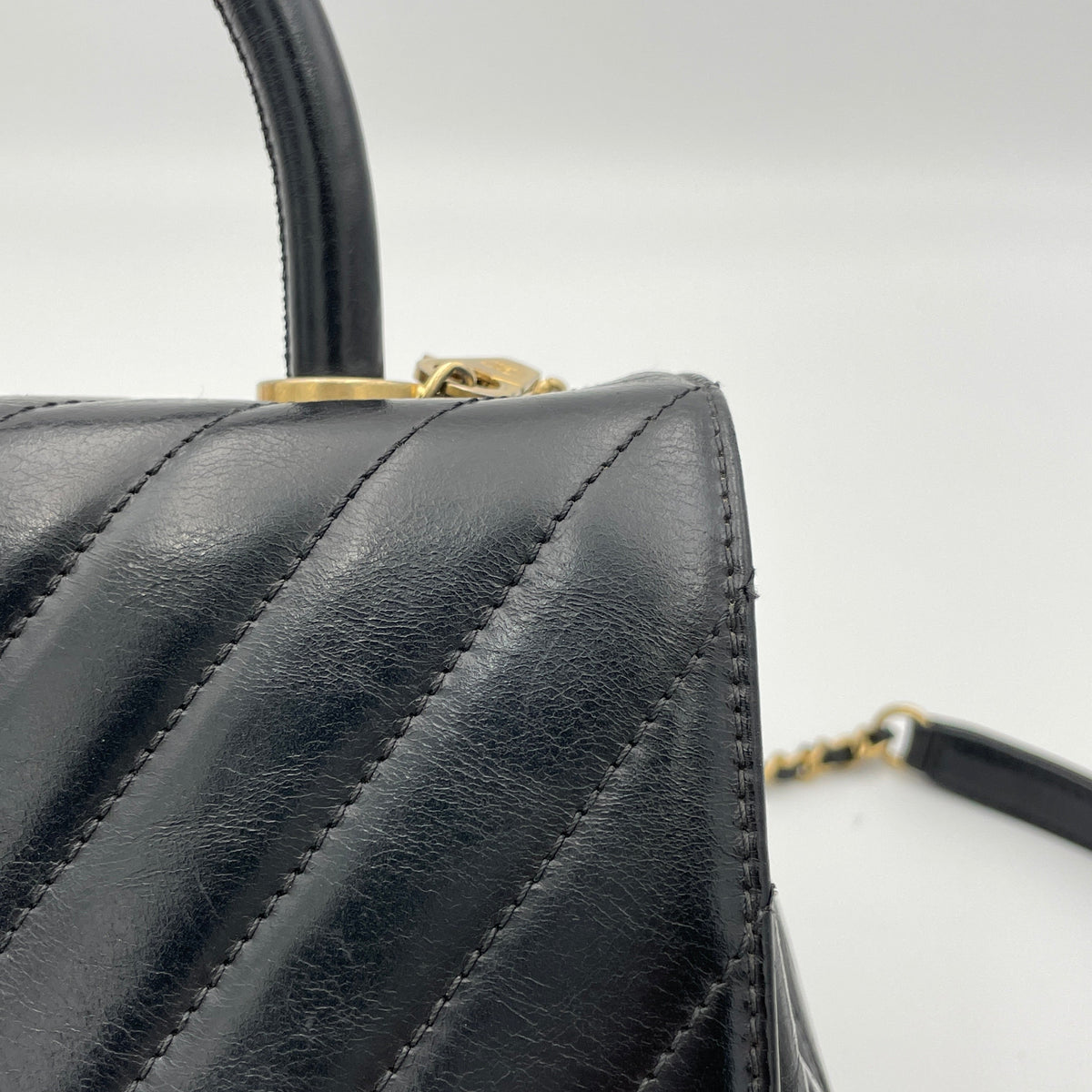Coco Flap Black Top Handle Bag in Calfskin, Gold hardware