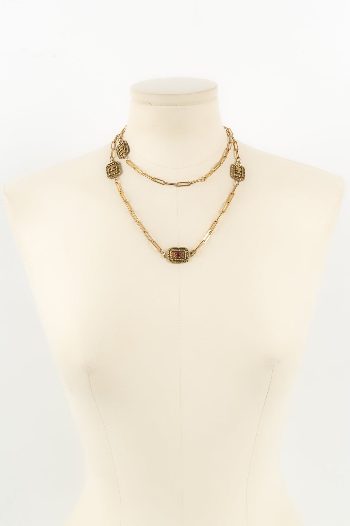 Collier doré Chanel 1984