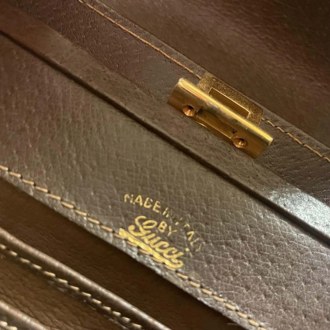 Gucci mod brown leather top handle Kelly bag w carnelian cabochon accents