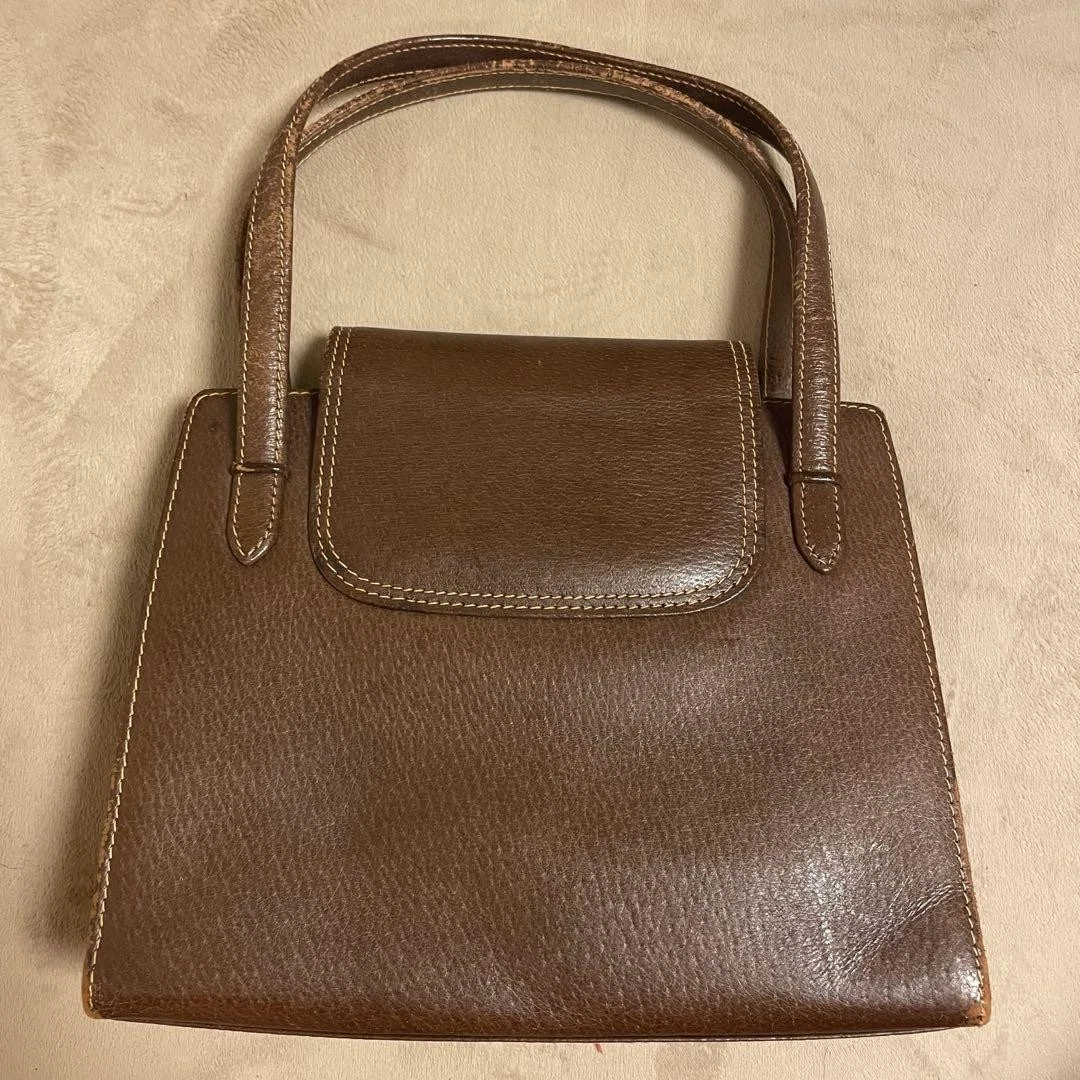 Gucci mod brown leather top handle Kelly bag w carnelian cabochon accents