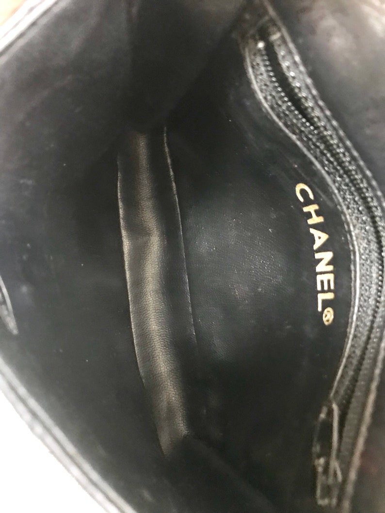 Chanel Vintage black leather waist purse, fanny pack with golden chain belt and CC closure hock