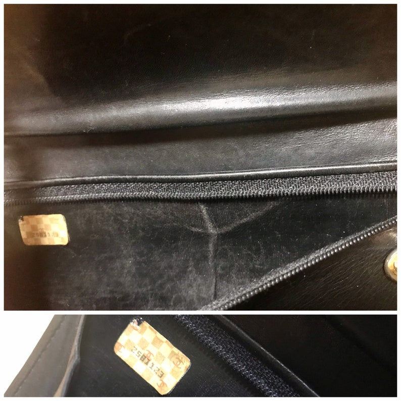Chanel Vintage black leather wallet with large CC stitch mark