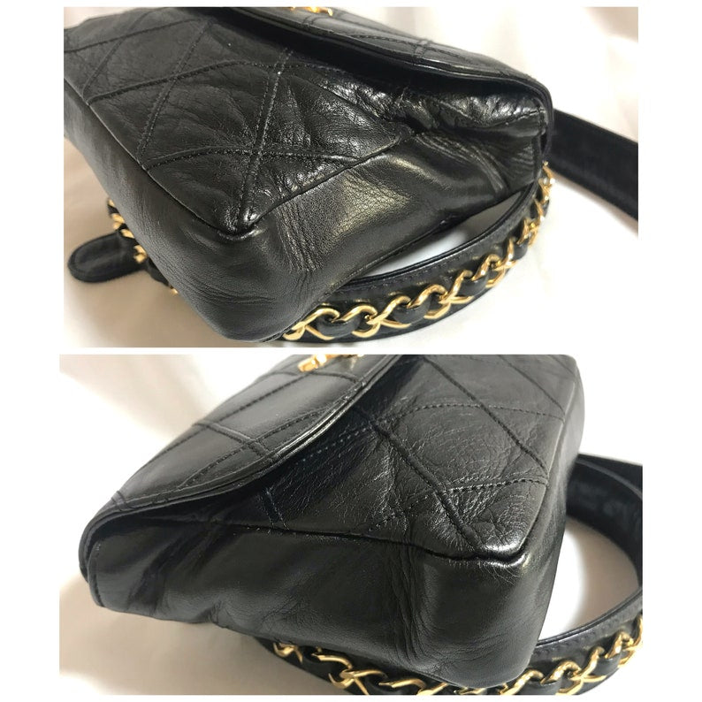 Chanel Vintage black leather waist purse, fanny pack with golden chain belt and CC closure hock