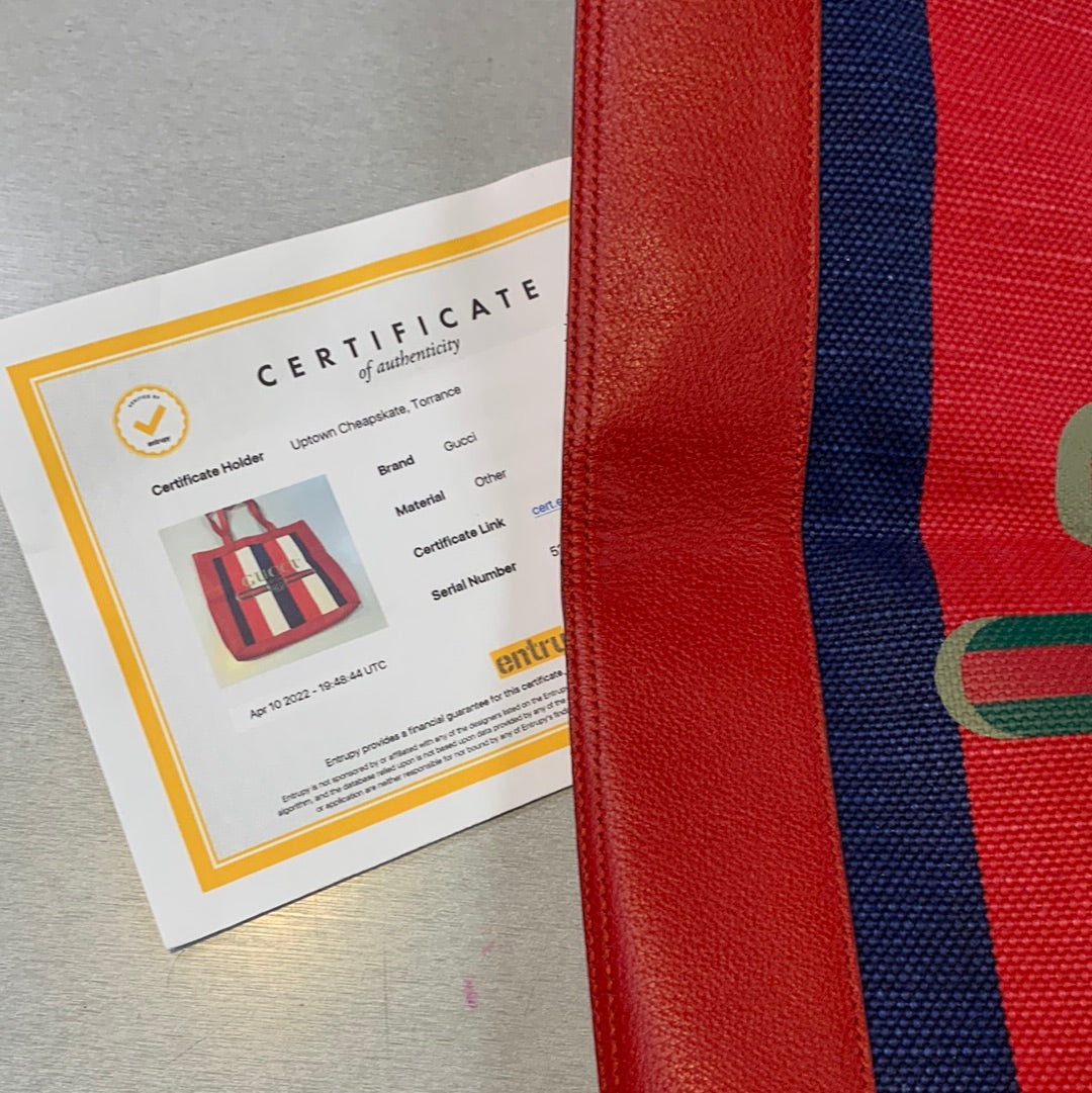 Gucci striped logo canvas tote bag.