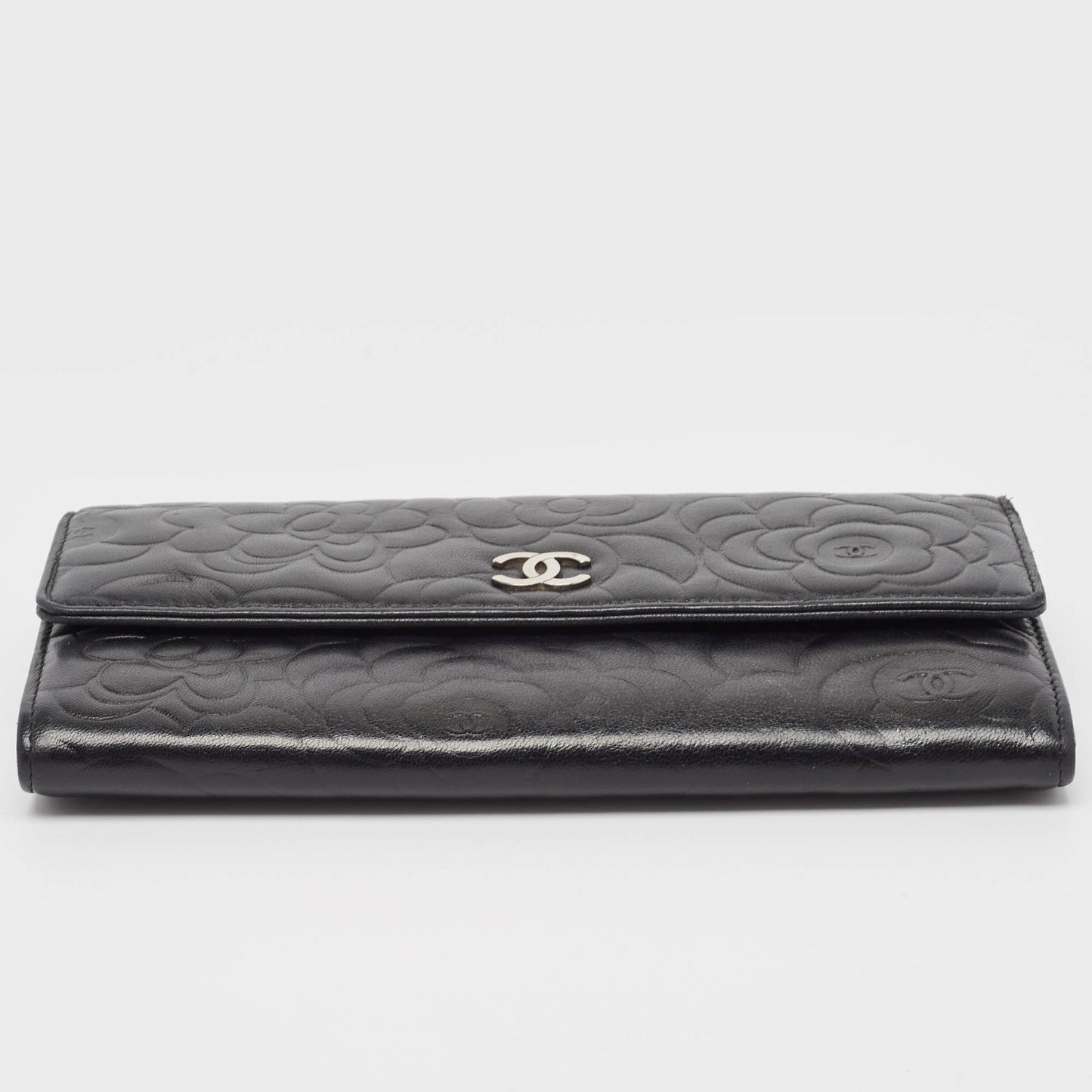 CHANEL Black Camellia Embossed Leather Large Flap Wallet