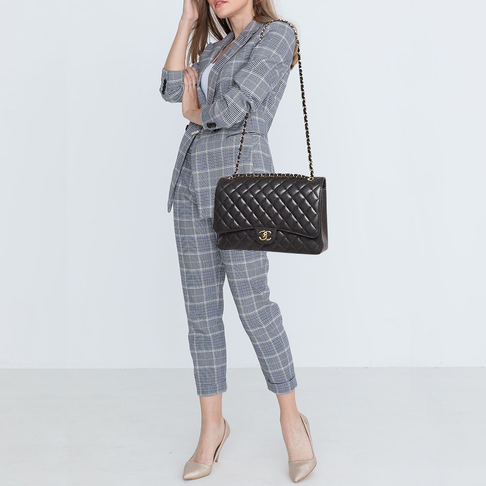 CHANEL Black Quilted Caviar Leather Maxi Classic Double Flap Bag
