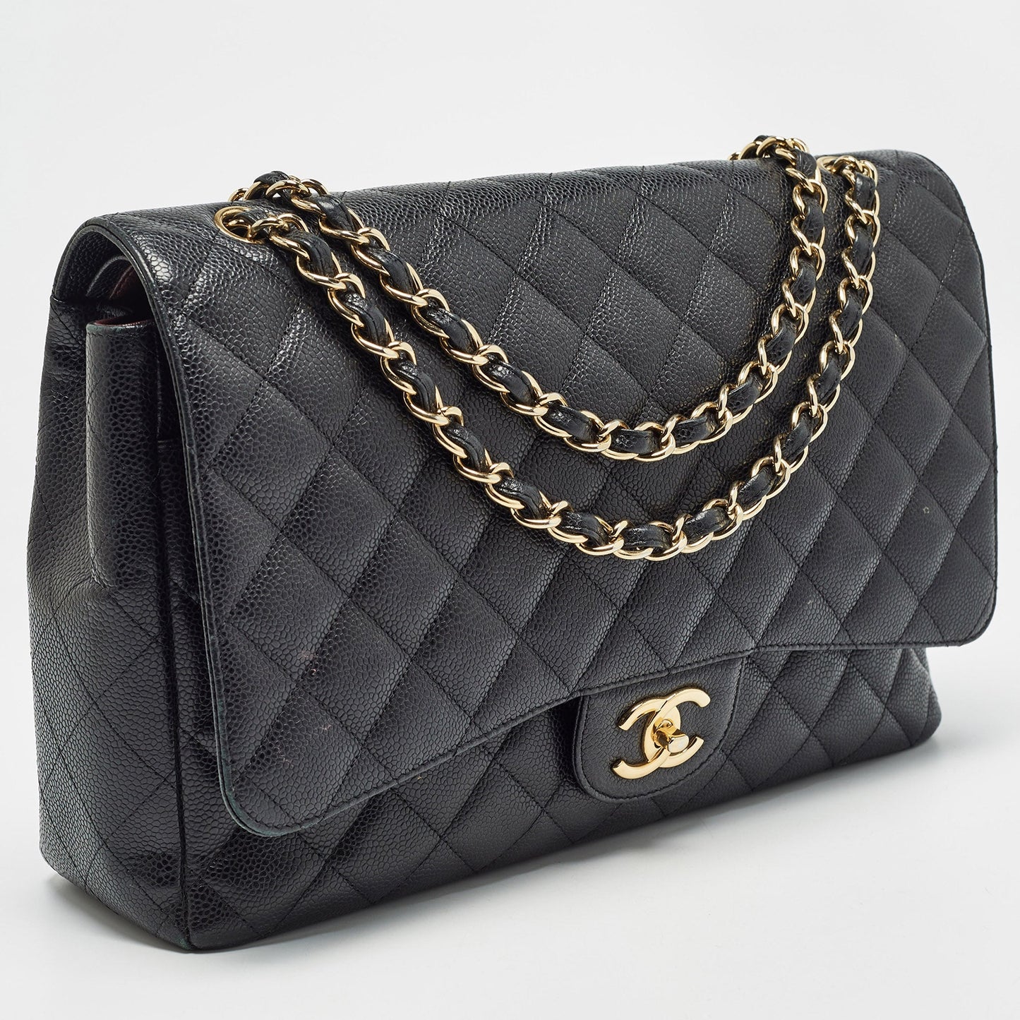 CHANEL Black Quilted Caviar Leather Maxi Classic Double Flap Bag