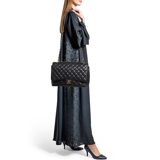 CHANEL Black Quilted Caviar Leather Maxi Classic Double Flap Bag