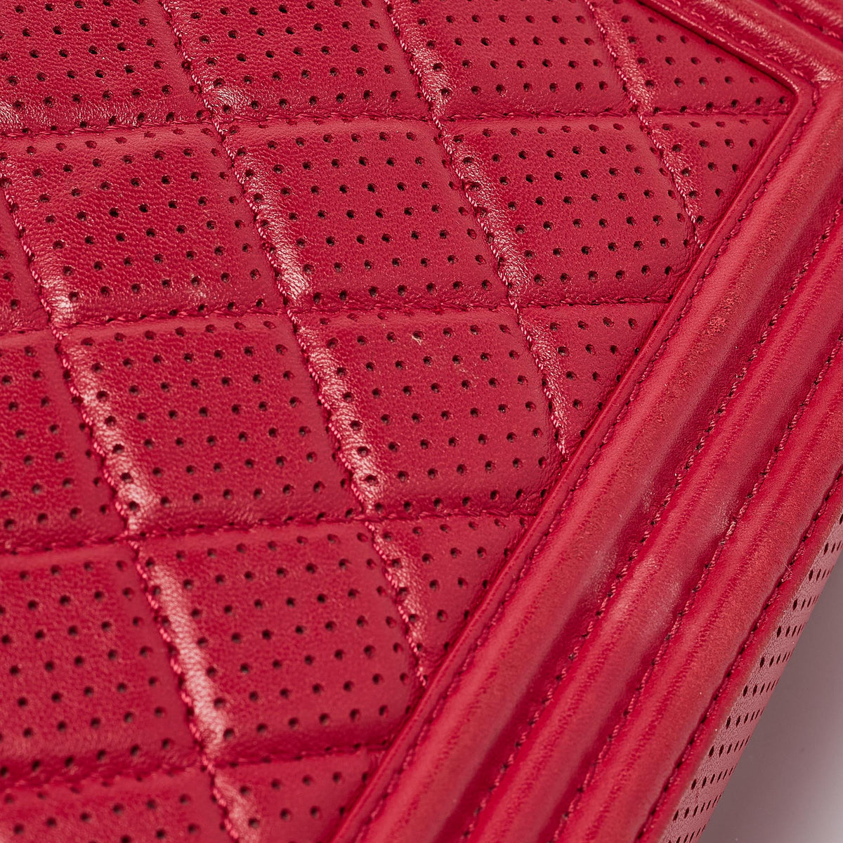 CHANEL Red Quilted Perforated Leather New Medium Boy Bag