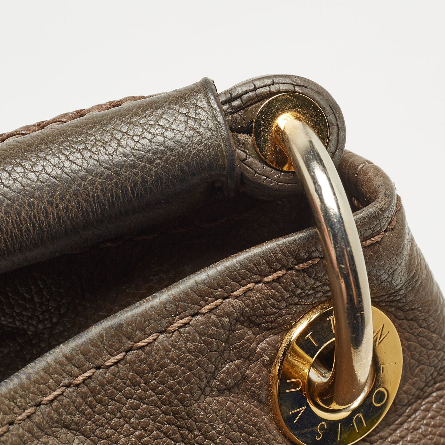 LOUIS VUITTON Terre Monogram Empreinte Leather Artsy MM Bag