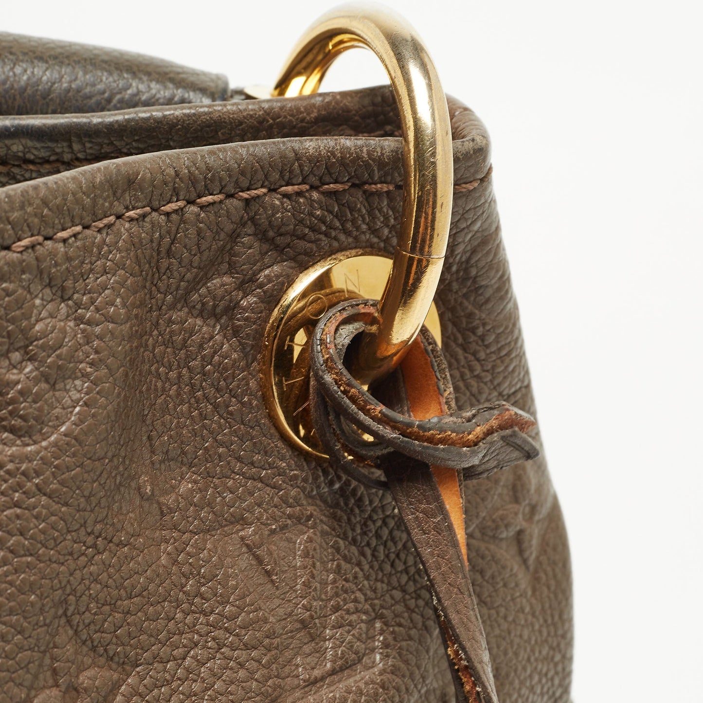 LOUIS VUITTON Terre Monogram Empreinte Leather Artsy MM Bag