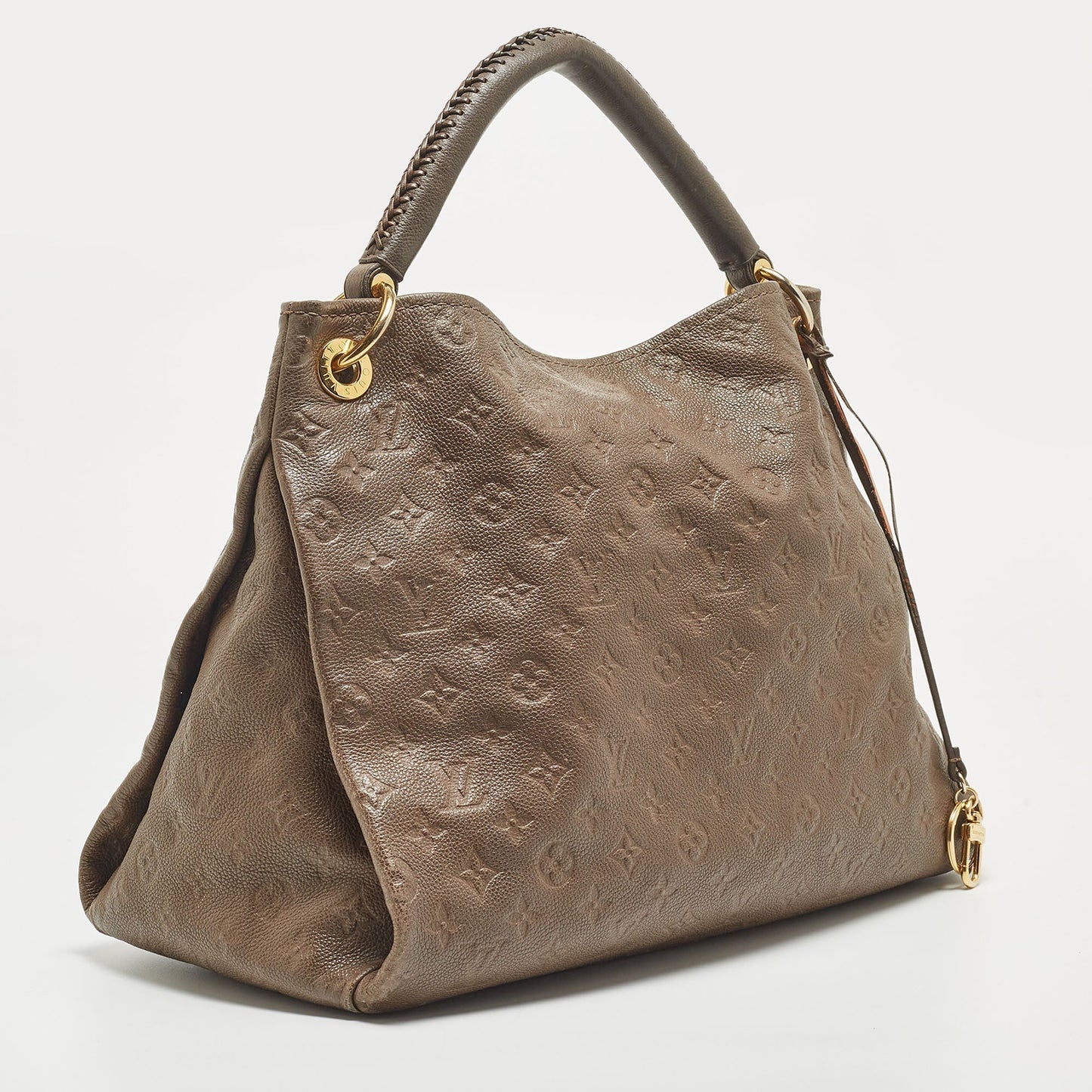 LOUIS VUITTON Terre Monogram Empreinte Leather Artsy MM Bag