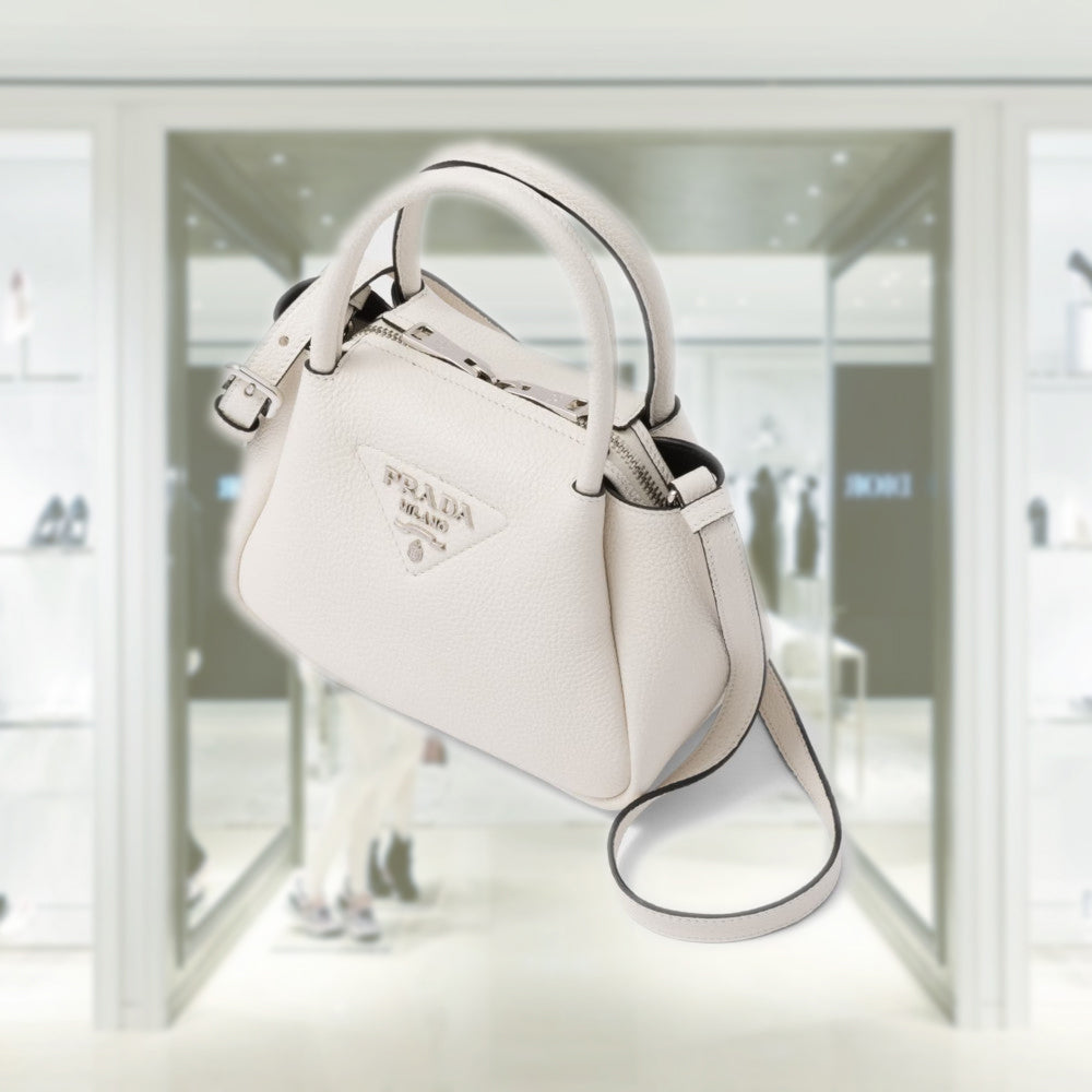 Leather mini handbag with zipper closure