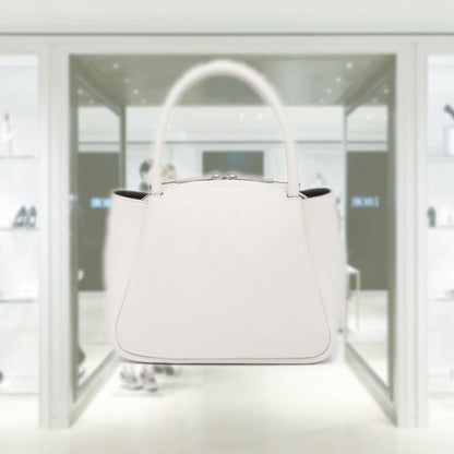 Leather mini handbag with zipper closure