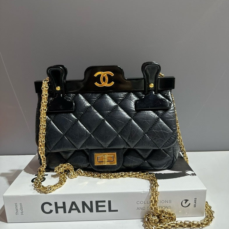 Chanel Clip Bag Small Black Quilted Leather