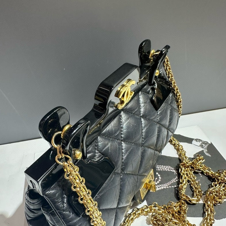 Chanel Clip Bag Small Black Quilted Leather