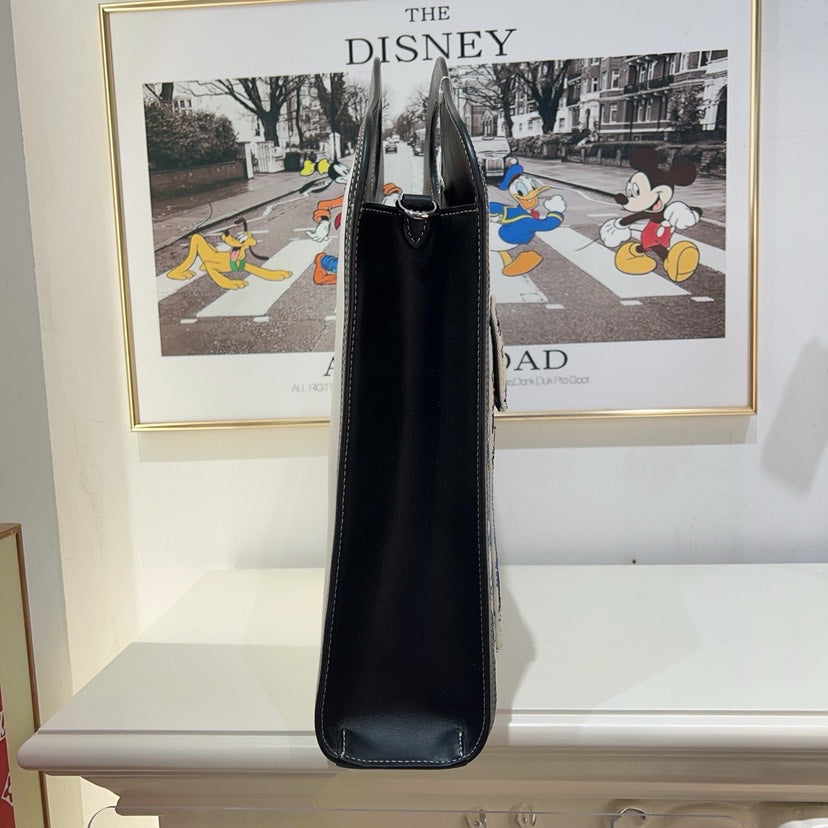 Preloved Burberry x Disney Printed Leather Crossbody Bag in Multicolor