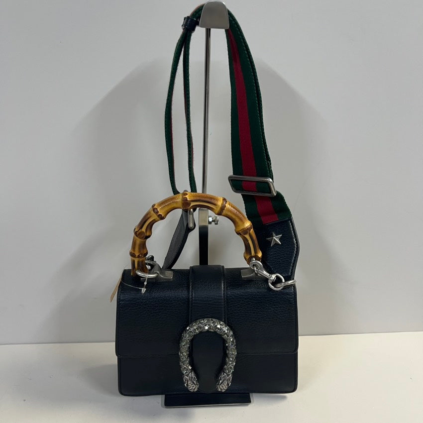 Gucci bag(s)