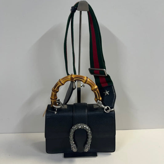 Gucci bag(s)
