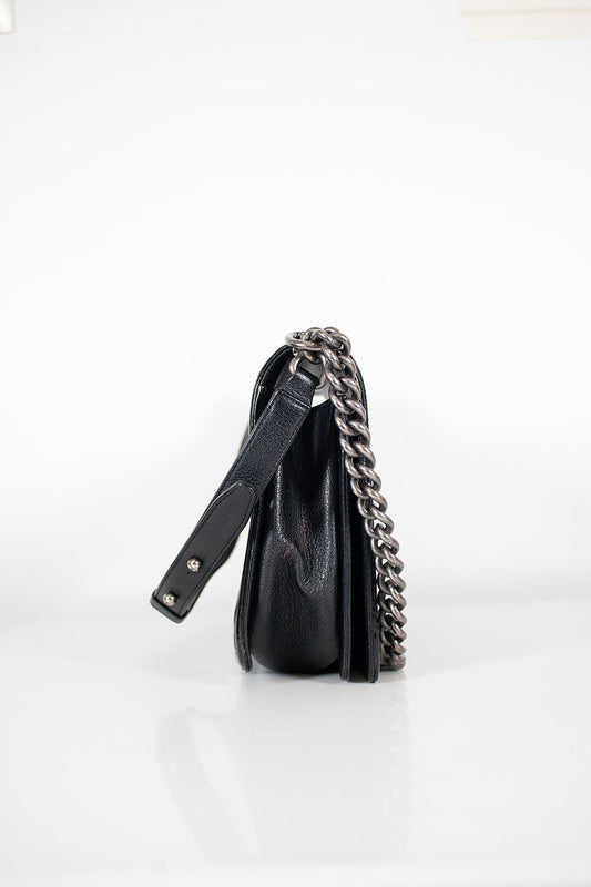 CHANEL Black grained calfskin quilted 'Boy' bag with ruthenium-finish hardware and patent border in 'New Medium' size